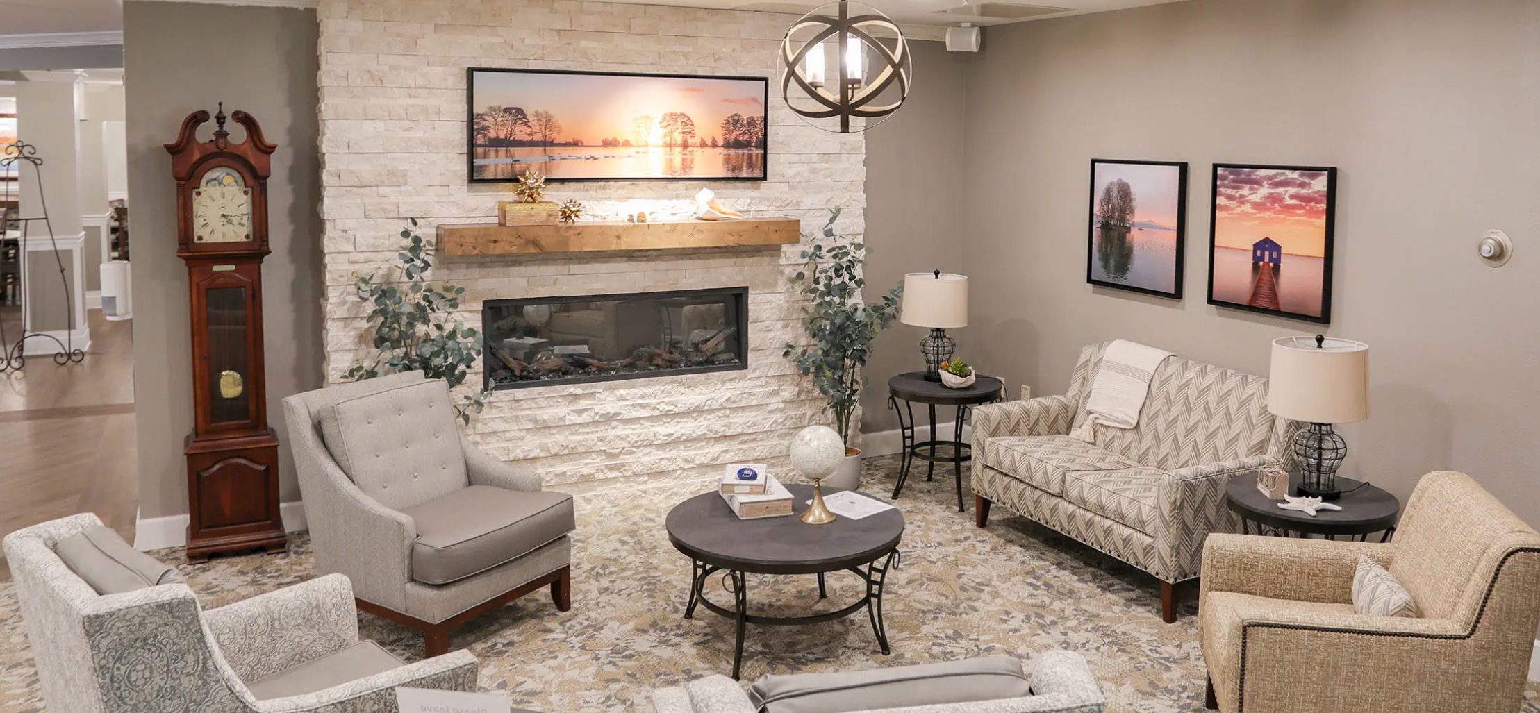 living room interior with a white stone fireplace - New Perspective Careers Assisted Living Careers