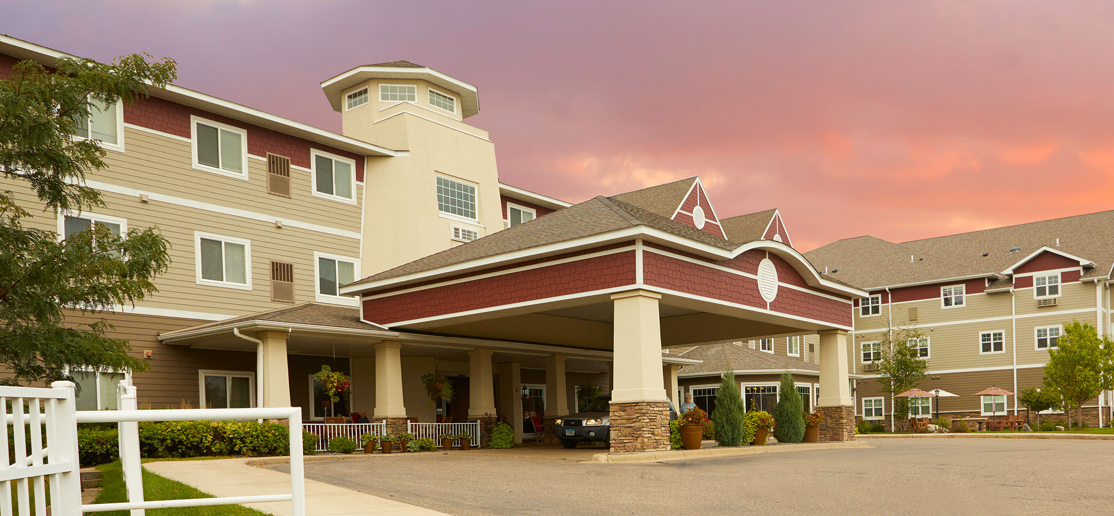 exterior of Waconia facility with red and light brown siding - New Perspective Careers Assisted Living Careers